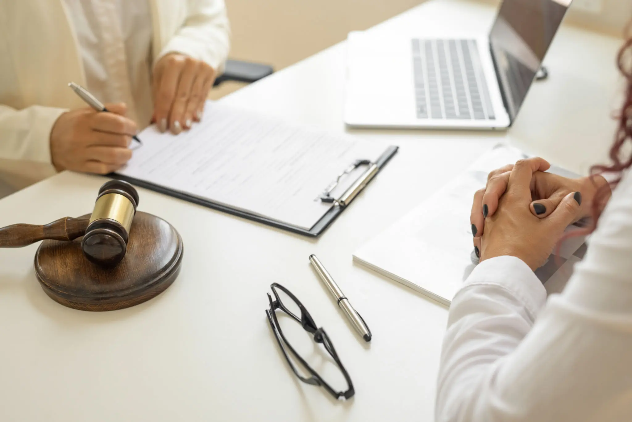 Two people meeting in law office