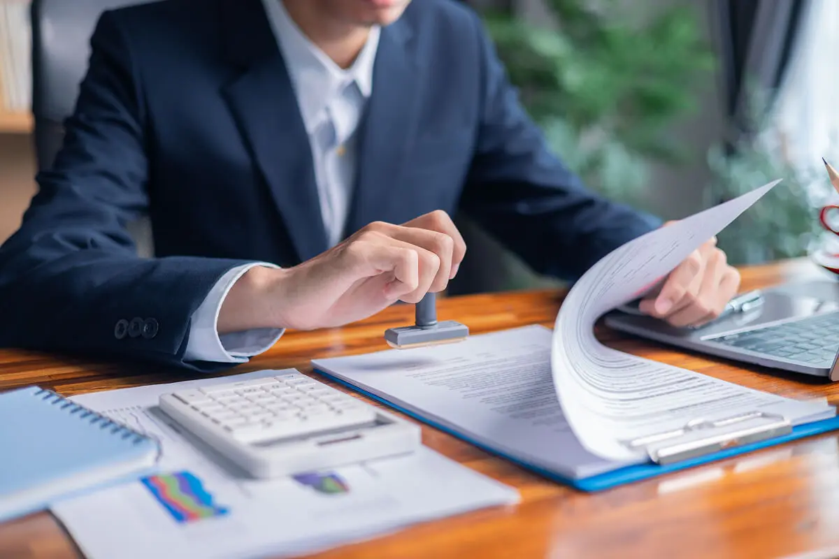 Office worker reviewing paperwork