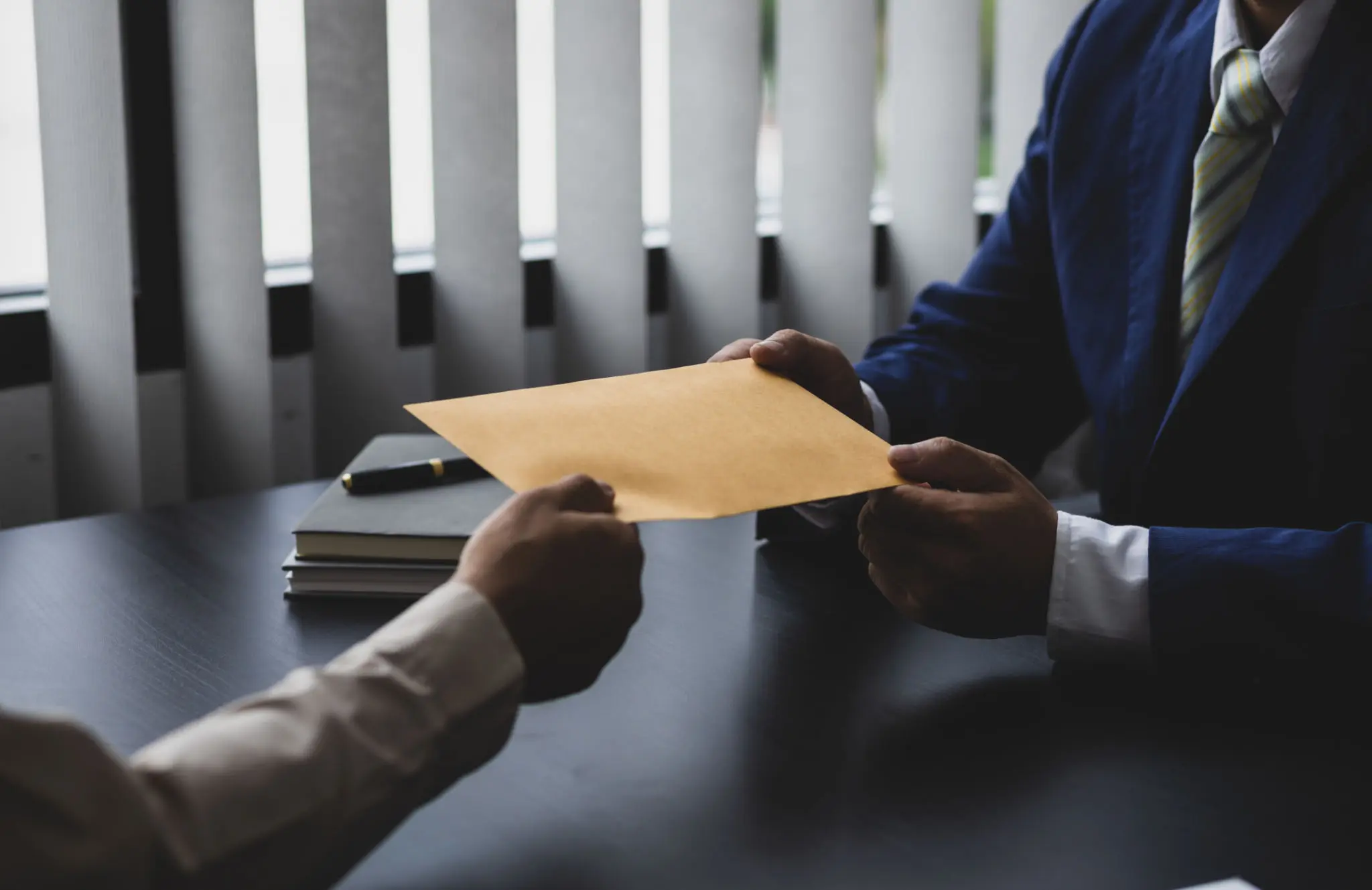 Passing documents across a table